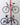 Tensioned pole for freestanding bicycle storage for garages